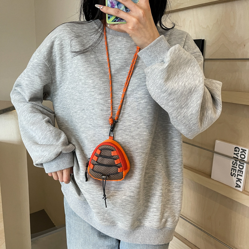 Coreana, bolso de hombro para niños y niñas, estilo extranjero, mini moda, bolso de auriculares para niños, nuevo bolso de cuello para niños.