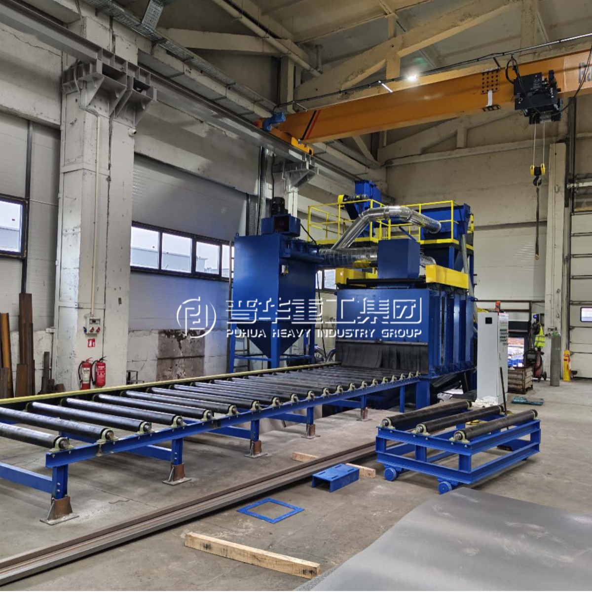 The pass-through shot blasting machine customized by the shot…