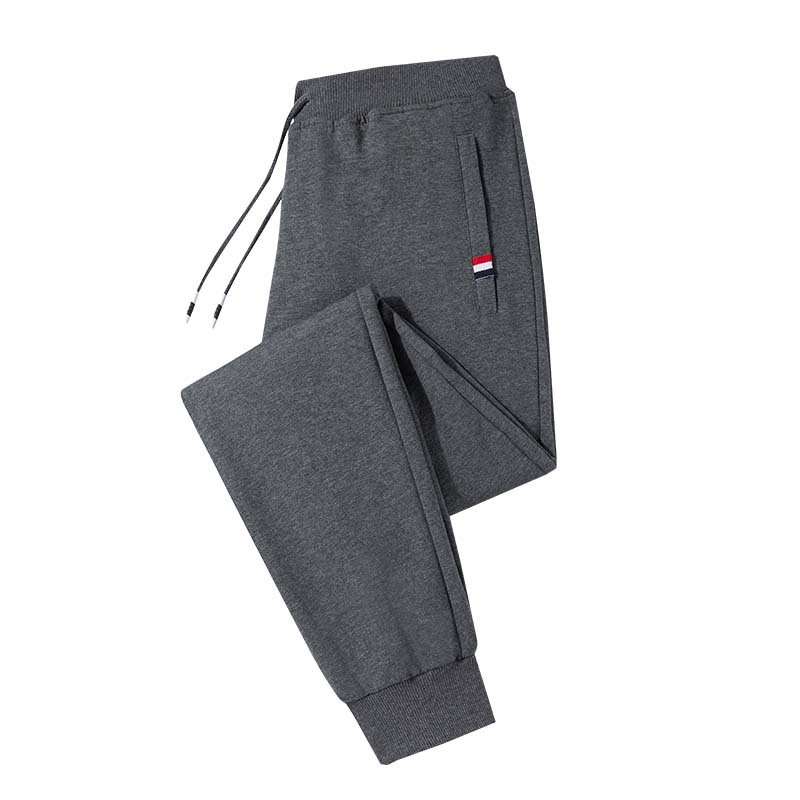 Primavera y otoño Mediados de cintura de color sólido casual juvenil algodón gris alto elástico sin cinturón pantalones sueltos ajustados Pantalones deportivos atados al tobillo