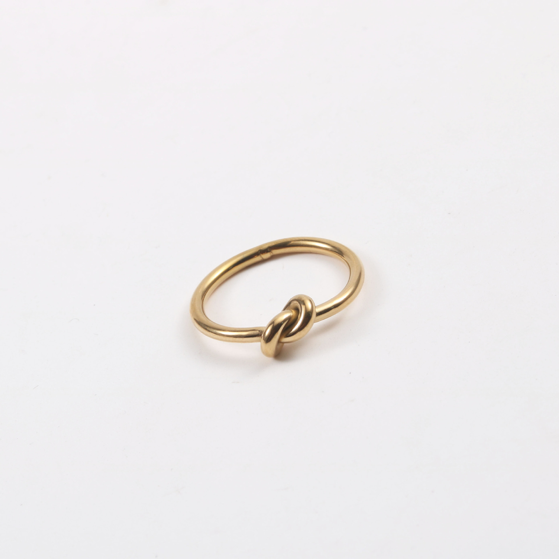 Línea de metal creativo anudado anillo femenino ins moda abierta dedo índice anillo de titanio de acero