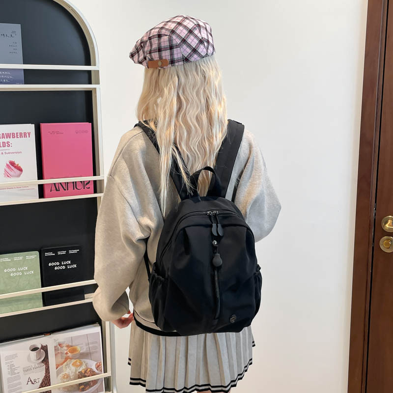 Mochila casual simple coreana para niños y niñas, mochila escolar de gran capacidad para niños, bolsas de viaje de color sólido de alto valor para niños