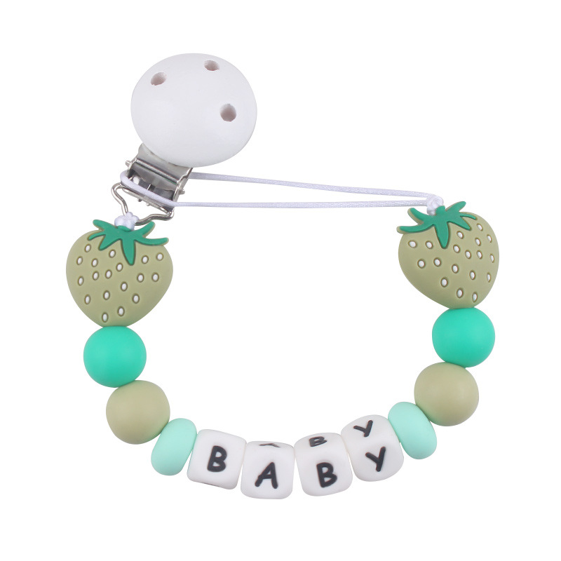 Nuevos productos para bebés Clip de chupete redondo de madera para calmar la cadena de chupete de silicona de fresa de dibujos animados para bebés