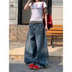 三条のバーのストライプをつなぎ合わせて、曲がりくねった刀のジーパンの女性の夏の新型のアメリカの復古の水洗いの広い足の長いズボンを作ります。
