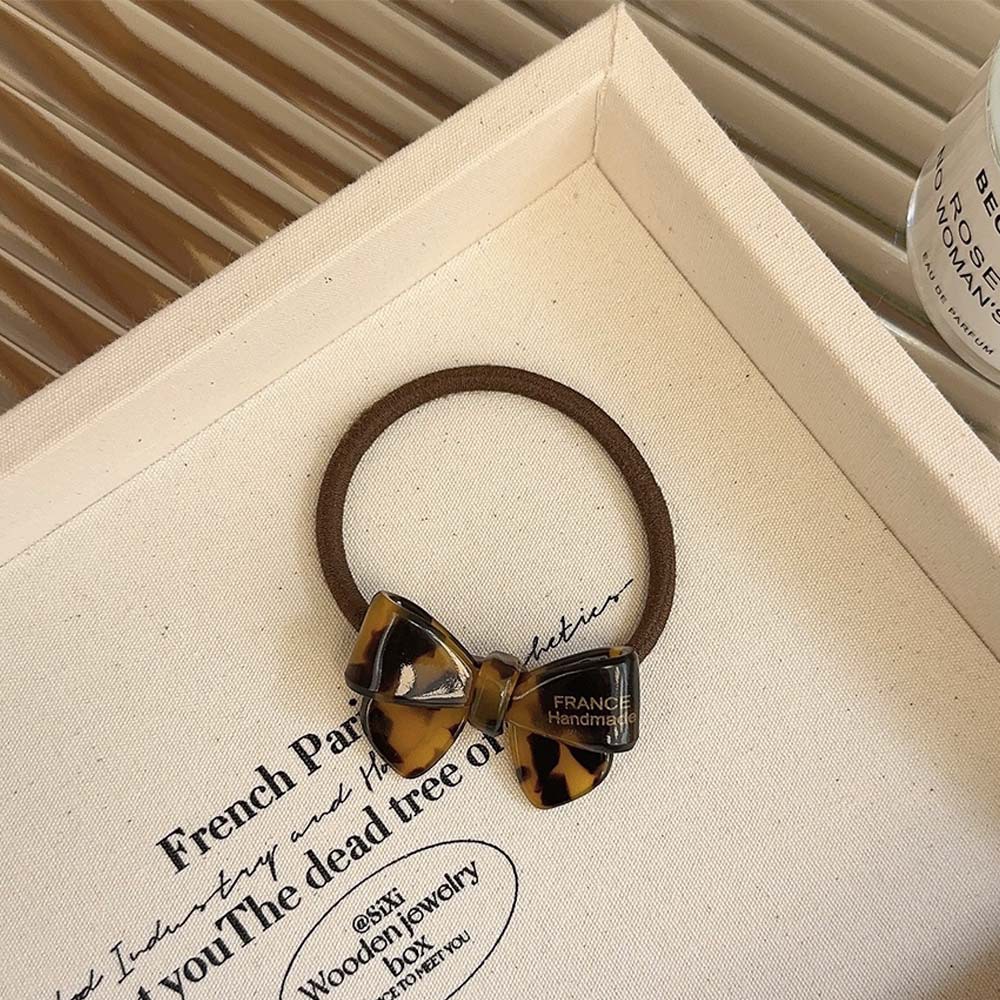 Coreano oro acético adorable arco de cabello anillo de cabello cuerda elástica cuerda de cabello duradera mujer