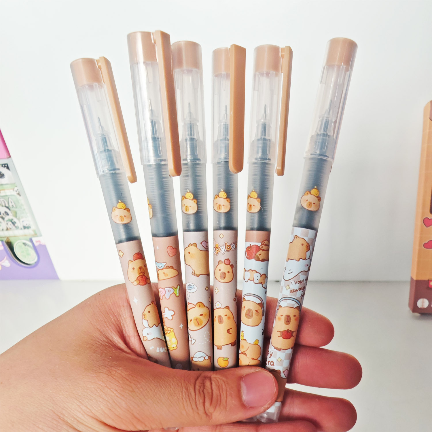 Bolígrafo con lazo recto Kapibala de alto valor y lindo, premio de papelería para estudiantes, bolígrafo de góner negro de secado rápido, bolígrafo de agua