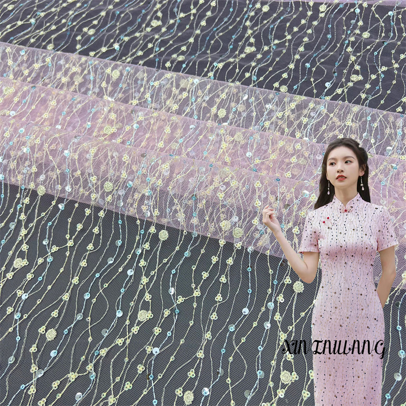 浅粉色波浪薄纱连衣裙布料春夏婚纱礼服旗袍女装网布亮片绣花面料