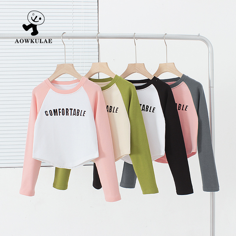 Primavera de estilo coreano ropa para niños Nueva Camiseta de manga larga para niñas media y grande para niños Raglan camisa de fondo corto para niños de manga larga al por mayor