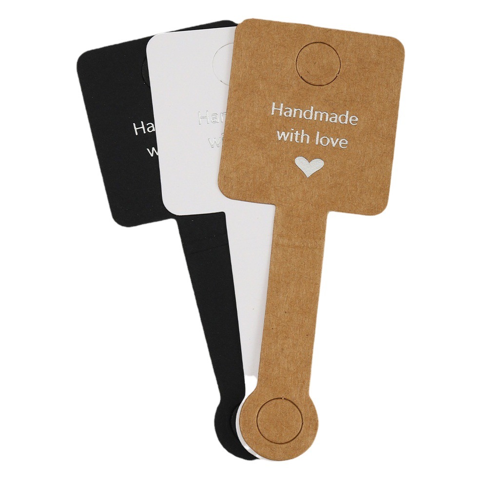 Tarjeta de embalaje adhesiva transfronteriza anillo de pelo joyería plegable Tarjeta de exhibición de cartón Tarjeta de pulsera de anillo de pelo al por mayor