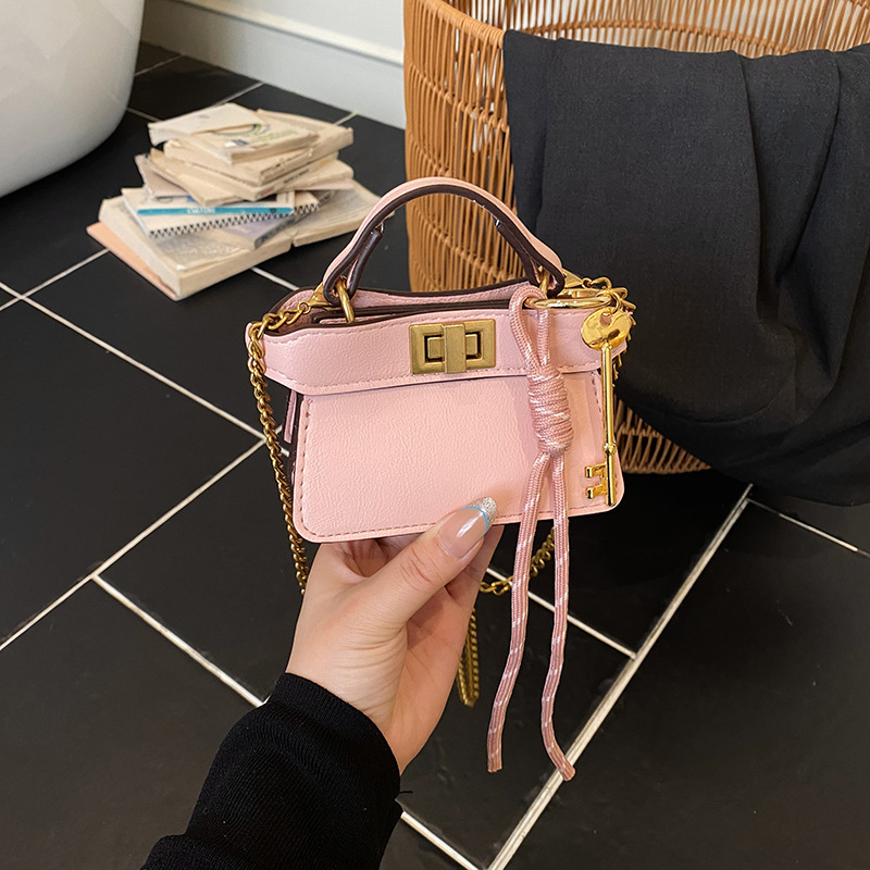 Coreano simple bolso de niña de color sólido mini bolso de bebé 2026 bolso para niños de comercio exterior transfronterizo