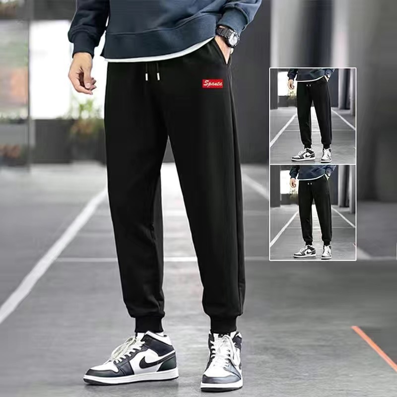 Pantalones de chándal forrados de lana de primavera y otoño para hombres de color sólido rectos delgados estilo coreano popular ins populares Pantalones deportivos casuales comercio exterior