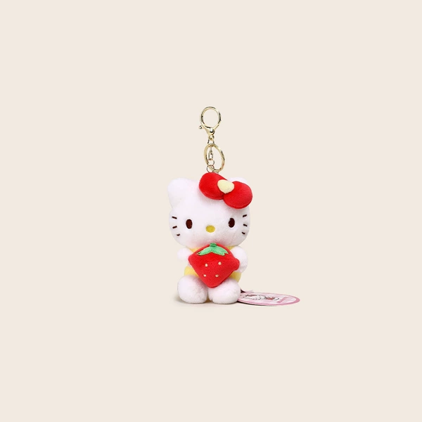 Kitty hugs strawberries