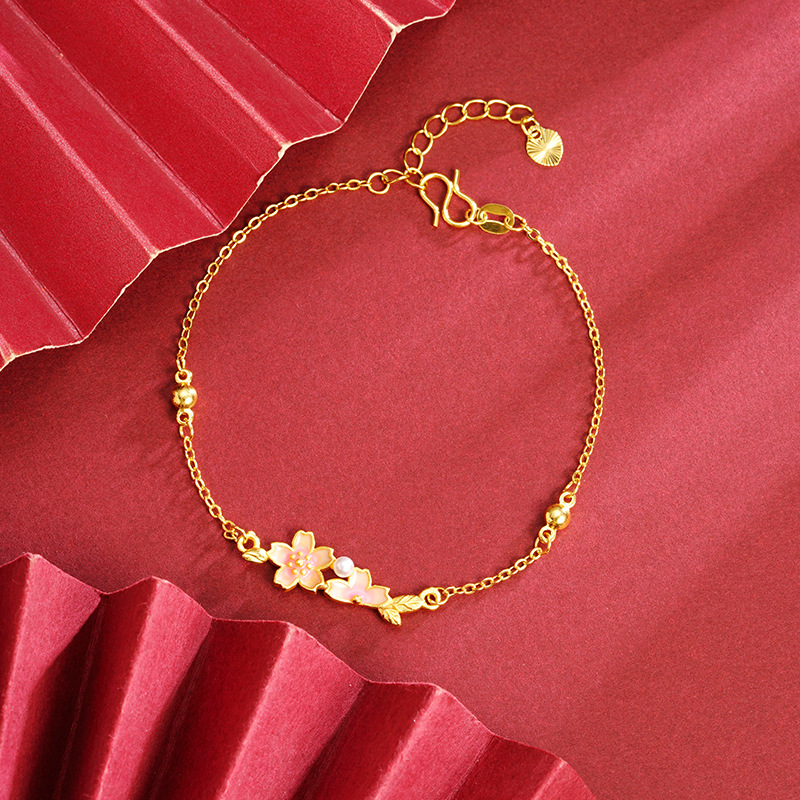 Nuevos productos de Vietnam Sha Jin nuevo estilo chino imitación de pulseras de flores de cerezo perlas versátiles lujosas y ligeras no se desvanecen joyas de alta calidad