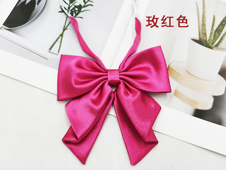 Spot al por mayor color sólido superficie brillante vino negro cuello rojo flor femenino estilo universitario nuevo estilo cola de golondrina plegable pajarita de raíz de pluma grande