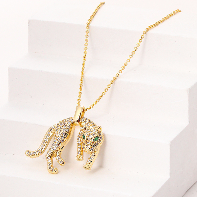 Nouveau collier polyvalent personnalisé hip-hop avec pendentif léopard en zircon et diamants, plaqué cuivre, véritable or transfrontalier, style hip-hop_voghion.com