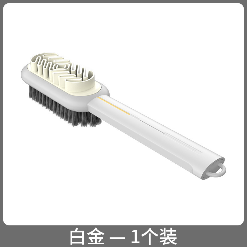 靴専用の長い柄の生えた靴は自動車のシートを磨いて汚れを落としてゴムの靴をきれいにします。|undefined