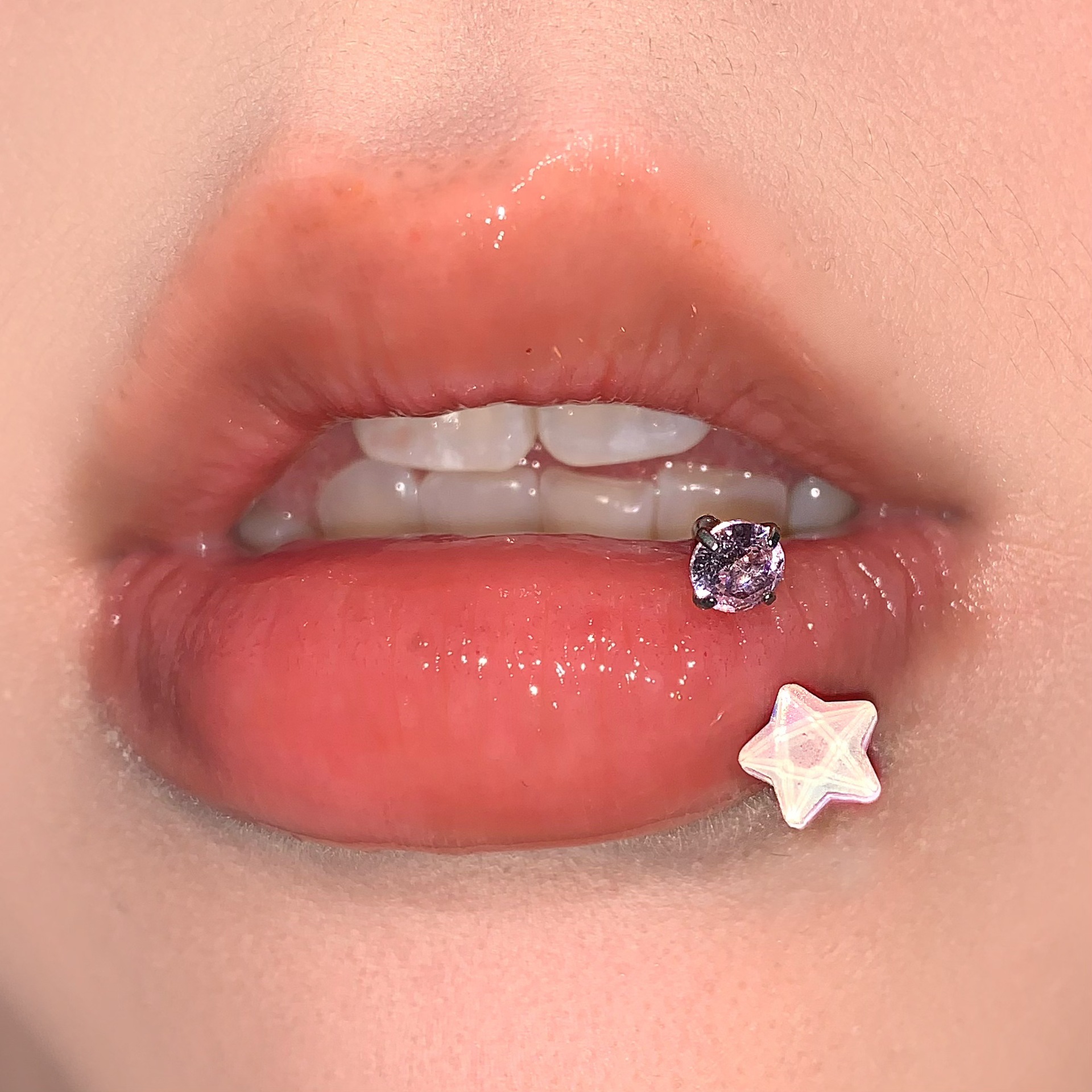 Silver pointed spike labret stud material detail