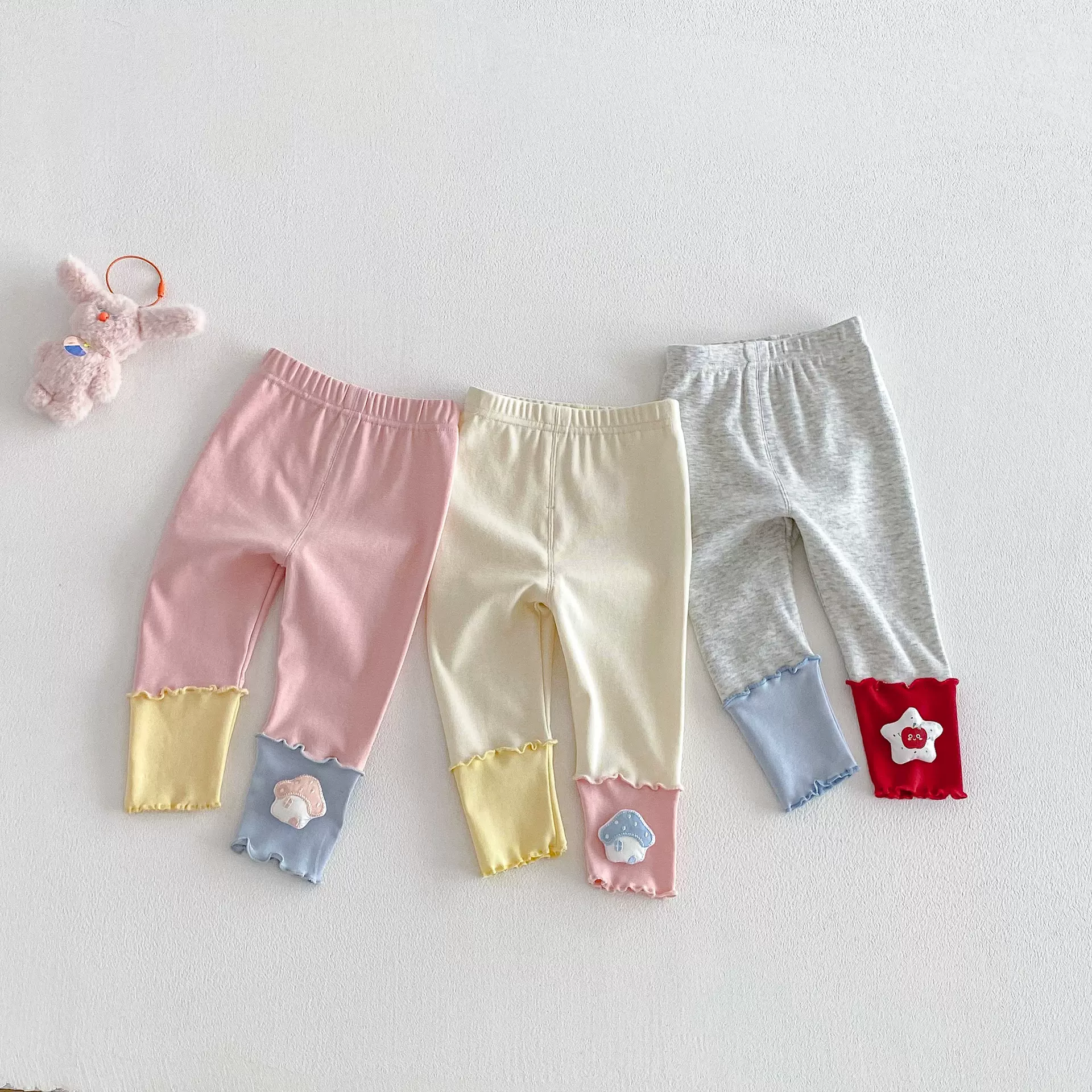 女童韩版打底裤2026新款春季宝宝洋气玩偶休闲裤儿童春装拼接裤子