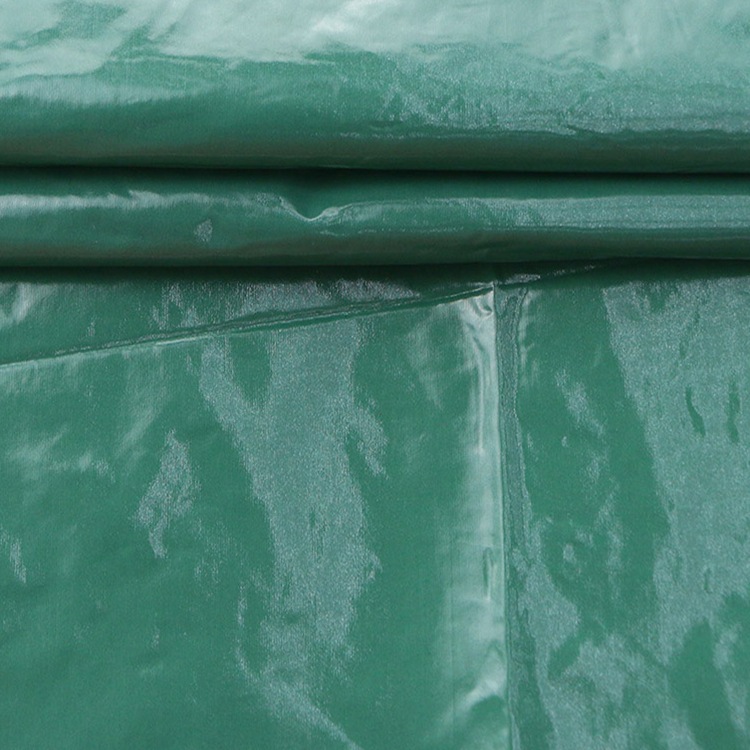 现货供应380t尼丝纺亮面羽绒服面料金属感亮pu防水现货棉服尼龙布