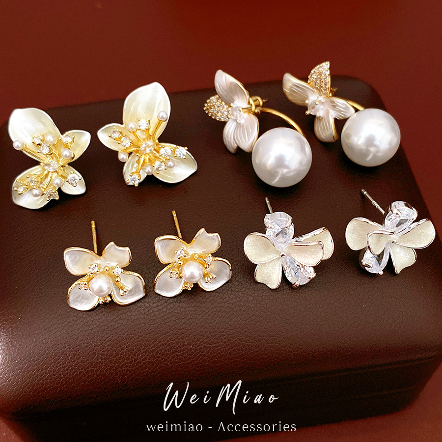 Agujas de plata, mariposas de piedra, flores, perlas geométricas, temperamento, personalidad, pendientes diarios, auriculares de lujo ligero y de alta calidad. image 1