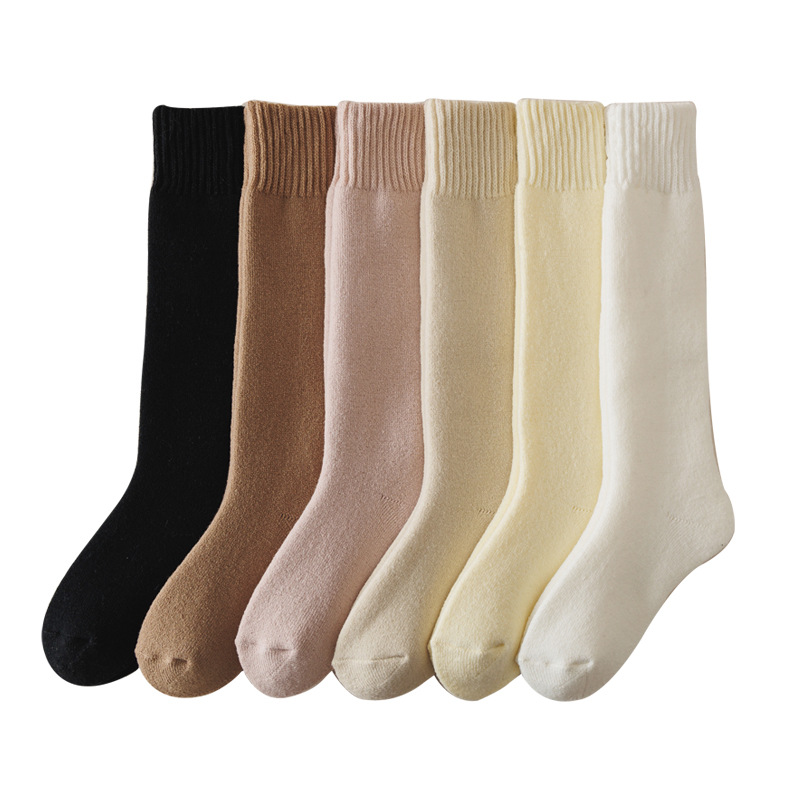 Otoño y invierno calcetines de lana para niños calcetines de pantorrilla gruesas resistentes al frío calcetines gruesas de invierno al por mayor calcetines de rodilla caseros