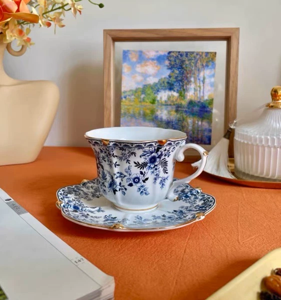Blue and white porcelain coffee cup and saucer