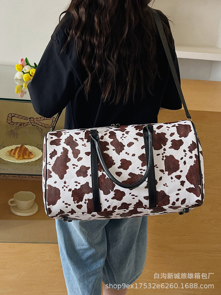 Nueva bolsa de viaje con patrón de vaca al por mayor bolsas de entrenamiento clásicas de gran capacidad de mano bolsas de embarque bolsas de almacenamiento image 5