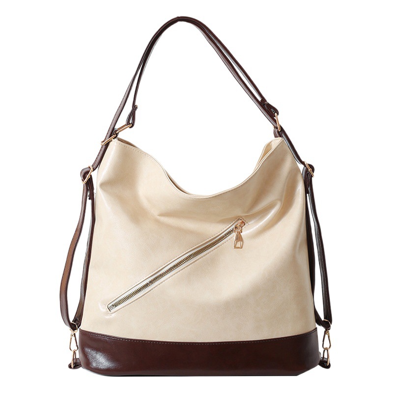 Cuero suave estilo coreano bolsa de hombro de gran capacidad para las mujeres 2024 principios de primavera nuevo versátil ins hombro axila bolsa