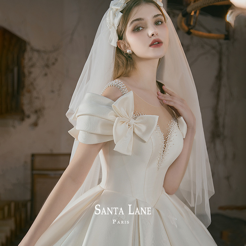 Vestido de novia de satén, nuevo modelo 2026 para novias, estilo vintage de alta gama, elegante y lujoso, con cola larga para mujer.