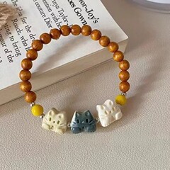 かわいい三色の猫の数珠のブレスレットの新しい中国式の国の潮の高い顔の値の百合の手は娘の蜜の恋人のカップルのプレゼントを飾ります。