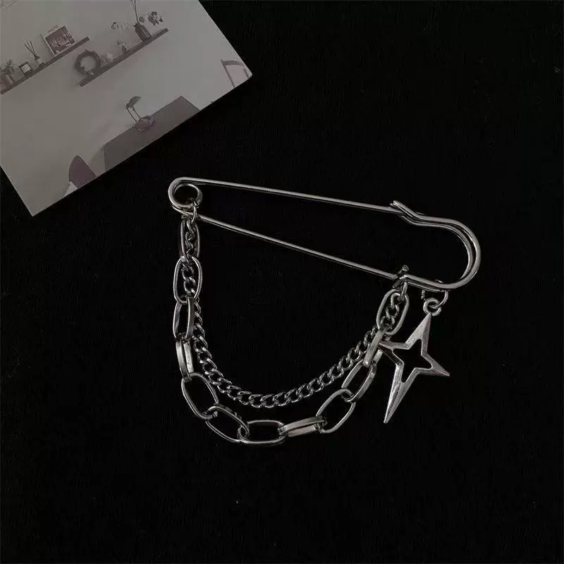 Trousers, brace, brooch, pin
