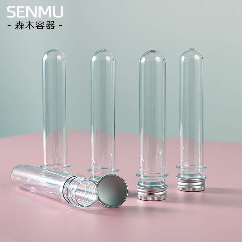 En stock material de embalaje cosmético PET tubo de máscara de plástico 40ml cilíndrico transparente tubo de ensayo botella cubierta de aluminio tubo de embrión sub-botella
