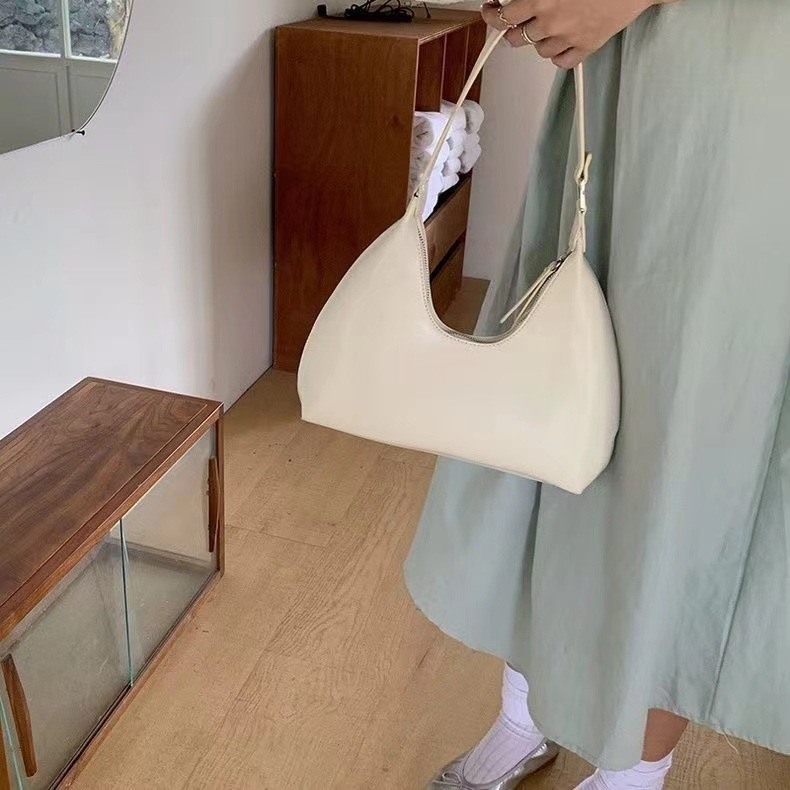 Bolsa de media luna de palo, bolso de nicho coreano de mujer, bolso de hombro de mujer, estilo de moda de alta calidad, bolso de brazo simple.