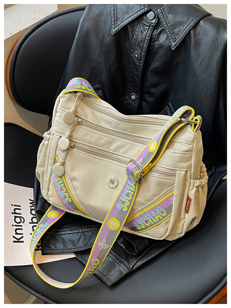 Bolsa de tela de nylon de gran capacidad de flujo para mujeres 2026 nuevo tipo de bolso de hombro ligero y simple de viaje a la oficina bolsa de ocio