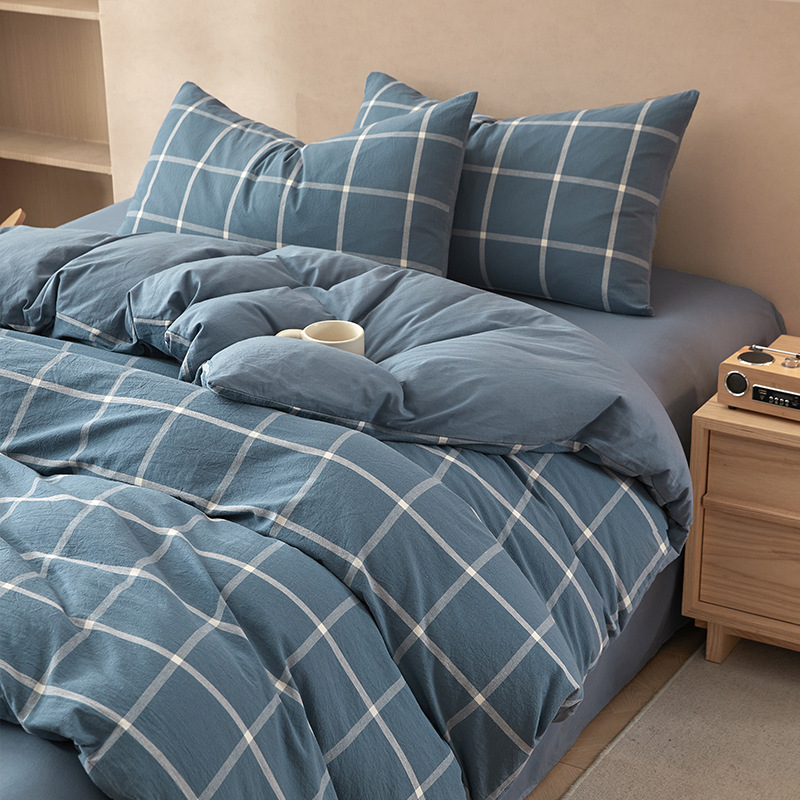 Nuevo traje de cama de algodón lavado de algodón de cuatro piezas de algodón 2025 nuevo traje de dormitorio de funda de edredón de sábana simple de tres piezas