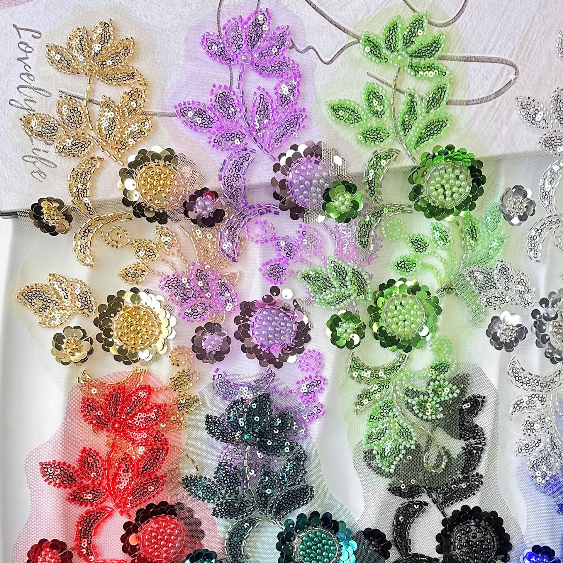 Sequinilla cuentas bordadas decal spot ropa al por mayor vestido de malla multicolor encaje vestido de rendimiento flores encaje
