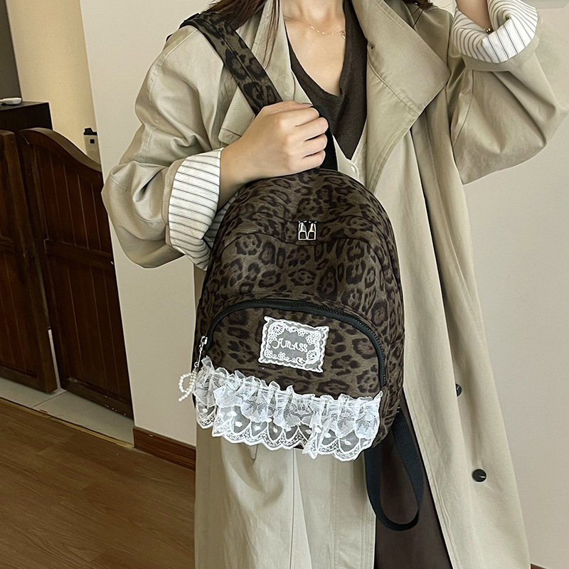 Mochila de moda coreana con patrón de leopardo para niños y niñas, mochila para niños de jardín de infantes, nueva mochila de niños de gran capacidad