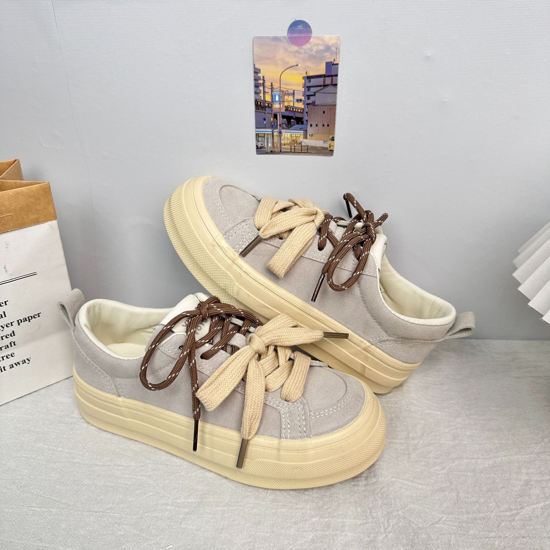 Yuanbo retro té con leche zapatos de lona niñas 2025 primavera y otoño suela gruesa japonesa negra marea nacional zapatos de suela blanda en nombre del cabello