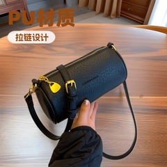 簡単で流行の小さい包みの女性の春の百合2025新型のファッションの斜めのショルダーバッグのネットの赤い爆発の円筒の枕の包み