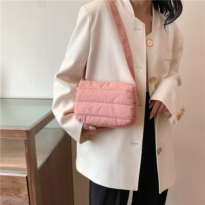 Daily casual simple small square bag Korean spring lightweight personality design popular shoulder crossbody horizontal small square bag_voghion.com