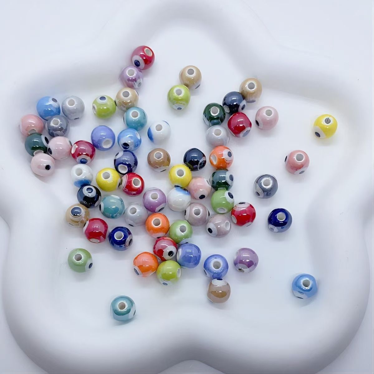 Cerámica de color simple perlada cara de pez cinco pétalos perlas de flores perlas sueltas diy accesorios de decoración de brazalete de cuentas hechas a mano