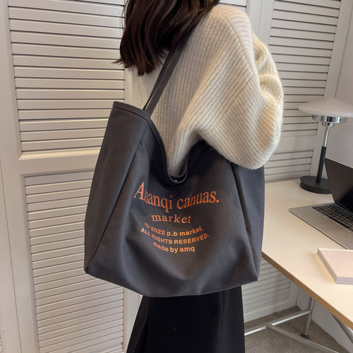 Canvas bag women's large capacity 2024 new versatile shoulder bag cloth bag college student class bag commuter tote bag
