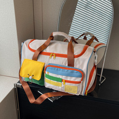 ファッションは色にぶつかって斜めにフィットネスバッグの大容量の旅行の荷物の包みにまたがります。