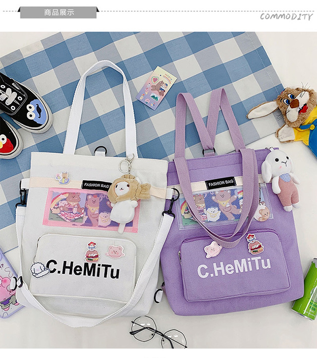 Korean-style canvas bag for girls with one shoulder, in the style of Harajuku, ulzzang, with a large capacity and contrasting colors, is a crossbody hand-held schoolbag for classes undefined
