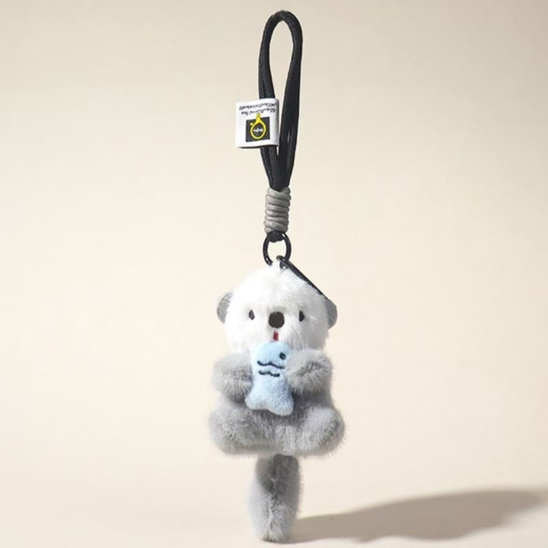 Nuevo lindo pescado nutria de peluche boutique llavero mochila colgante máquina de muñeca marina regalo pareja