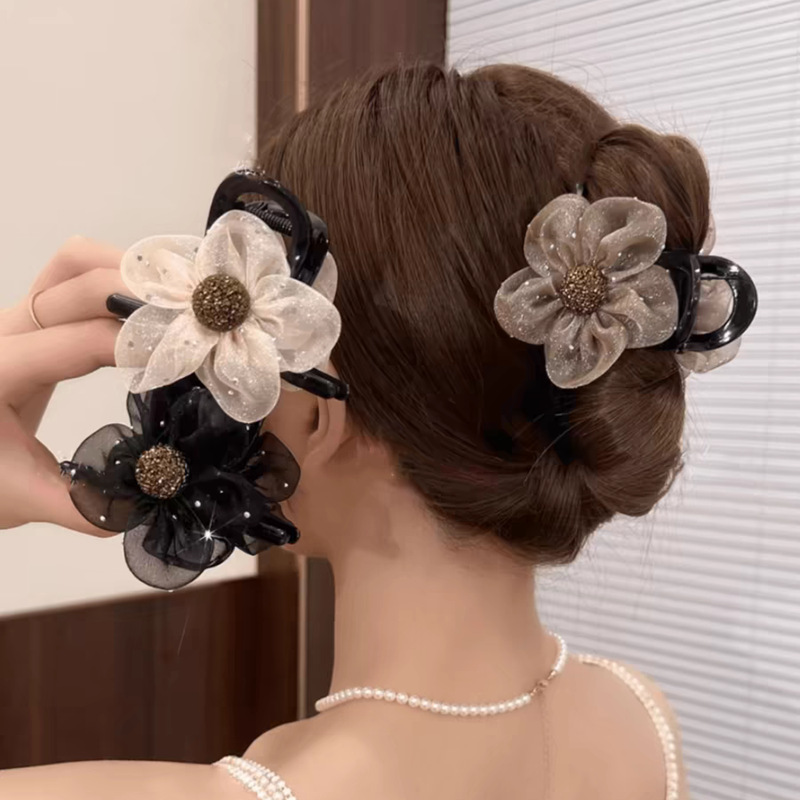夏季水钻太阳花朵发夹女2025年新款后脑勺盘发抓夹气质半扎鲨鱼夹