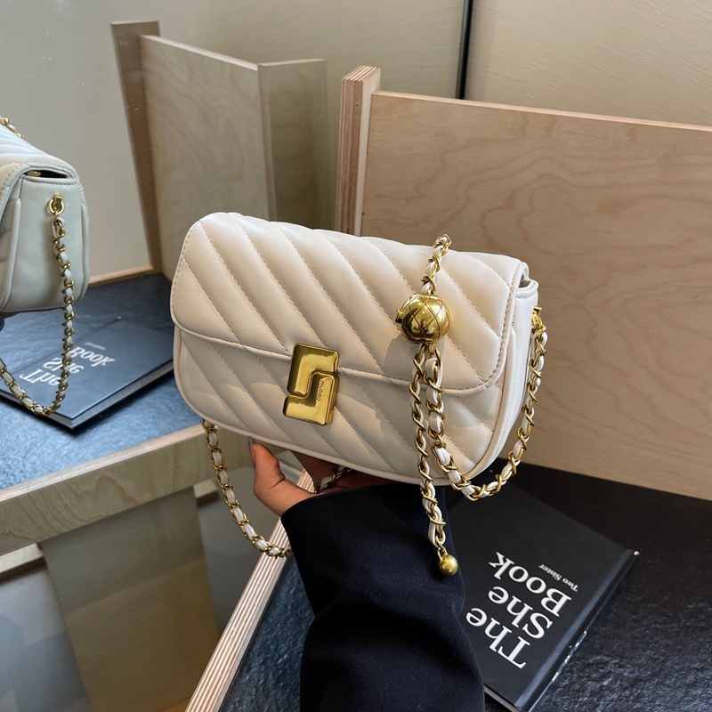 Borsa a tracolla piccola da donna, elegante e versatile, con catena di diamanti, modello 2025, di lusso, di nicchia e di alta gamma._voghion.com