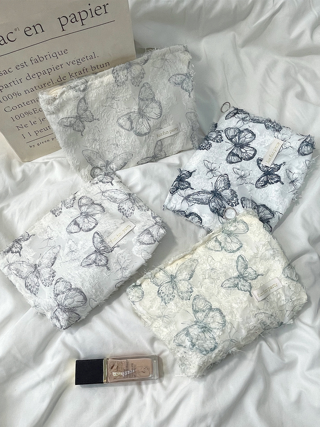 Ins lace mariposa alta sensación bolsa de maquillaje bolsa de almacenamiento para productos de cuidado de la piel bolsa interior bolsa de almacenamiento para viajar bolsa de lavado