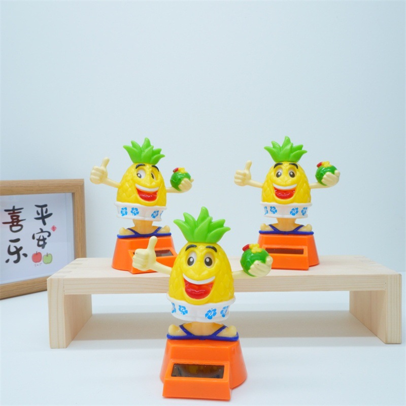 太阳能摆件菠萝头摇头公仔卡通礼物儿童跨境内饰创意内饰汽车用品详情1