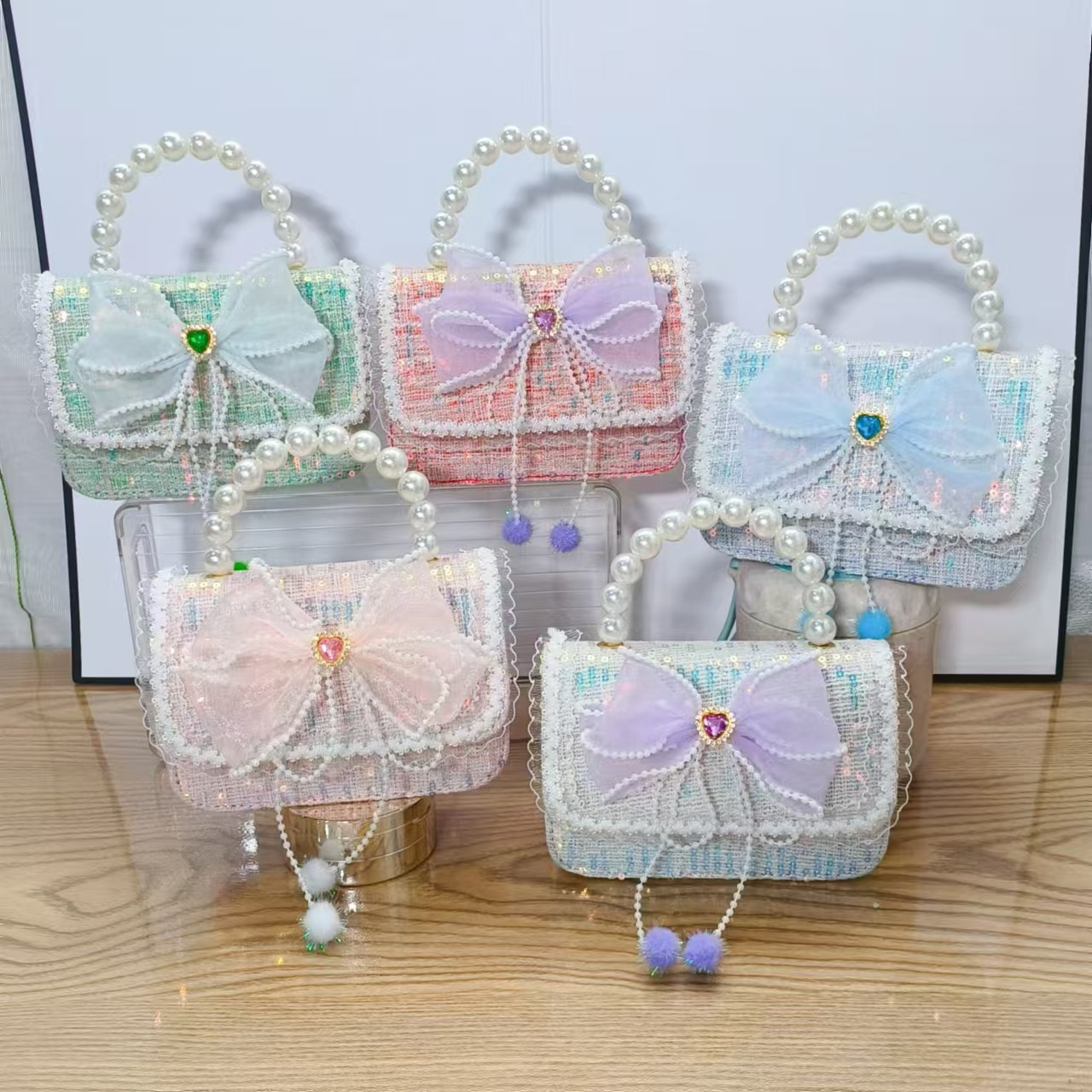 Bolso de arco princesa bolso de perlas bolso de mano cadena bolso de niños pequeño viento fragante bolso de hombro para chicas regalos