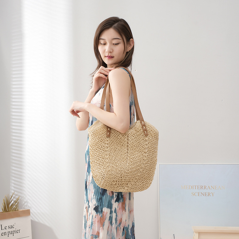 Nueva celebridad de Internet de gran capacidad bolso de viaje de vacaciones playa tejida bolsa de hombro de Europa y América retro bolsa de paja de color sólido